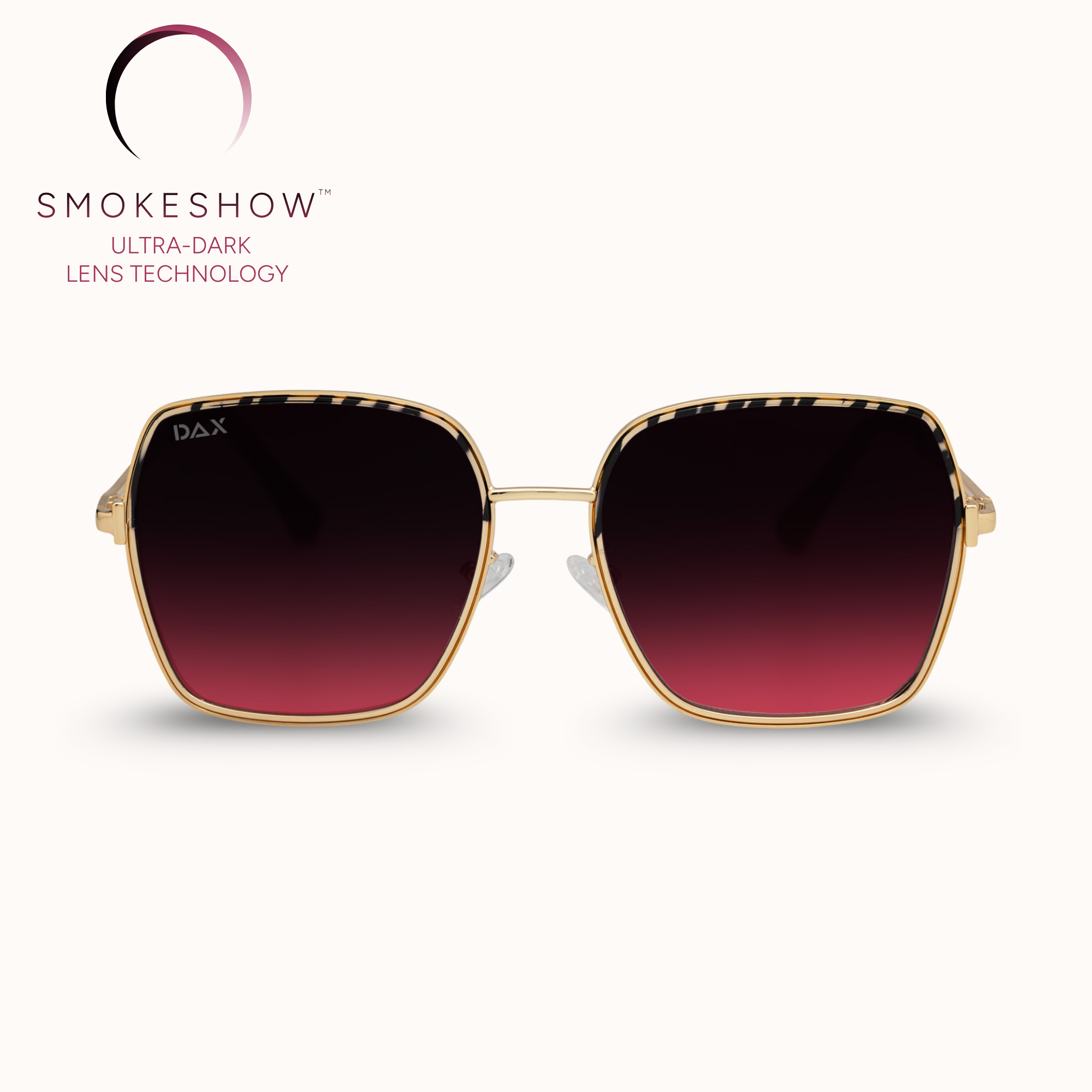 Sunglasses with gold frame and dark gradient lenses on a white background, featuring the Smokeshow brand.