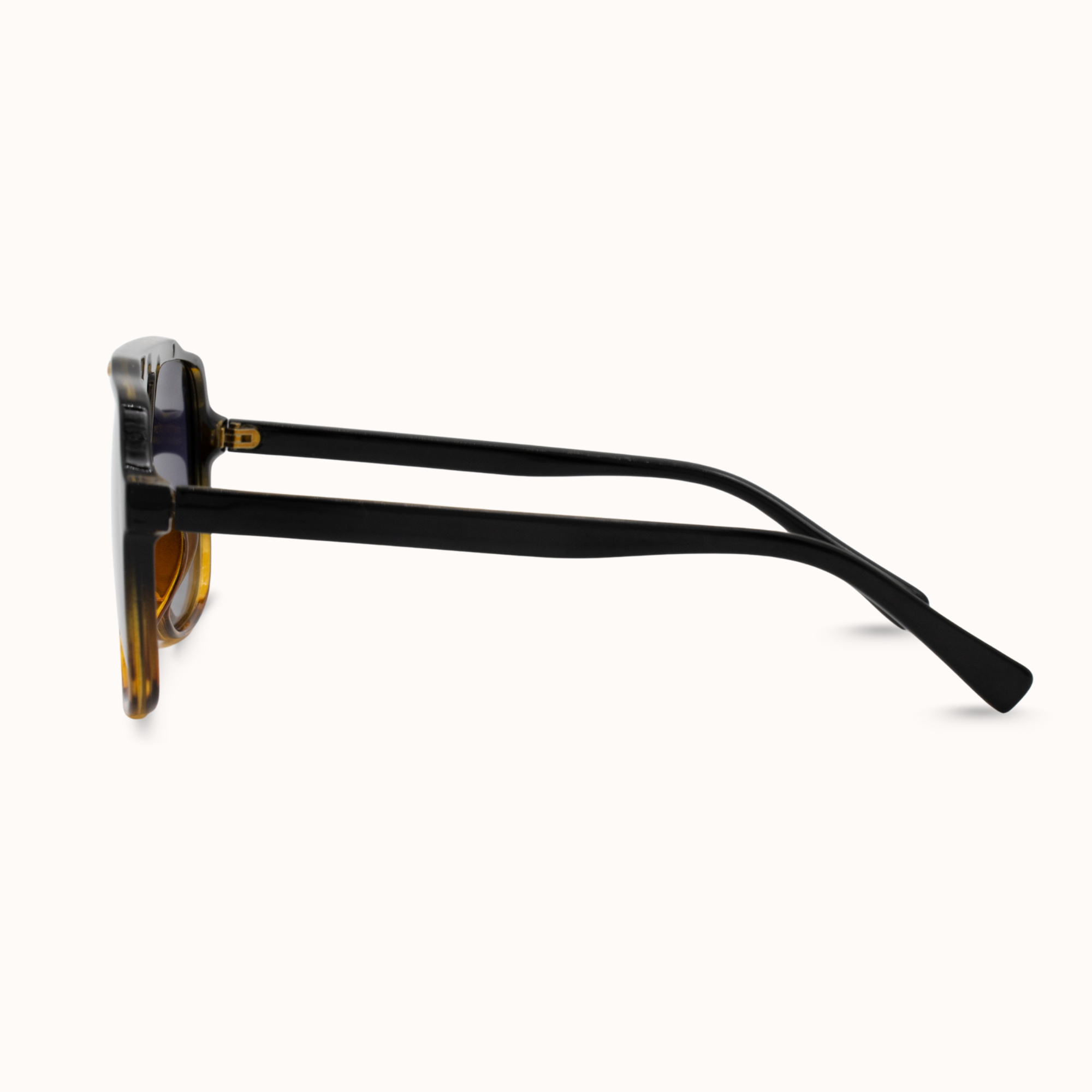 Sunglasses with a black frame and tortoiseshell lenses on a white background