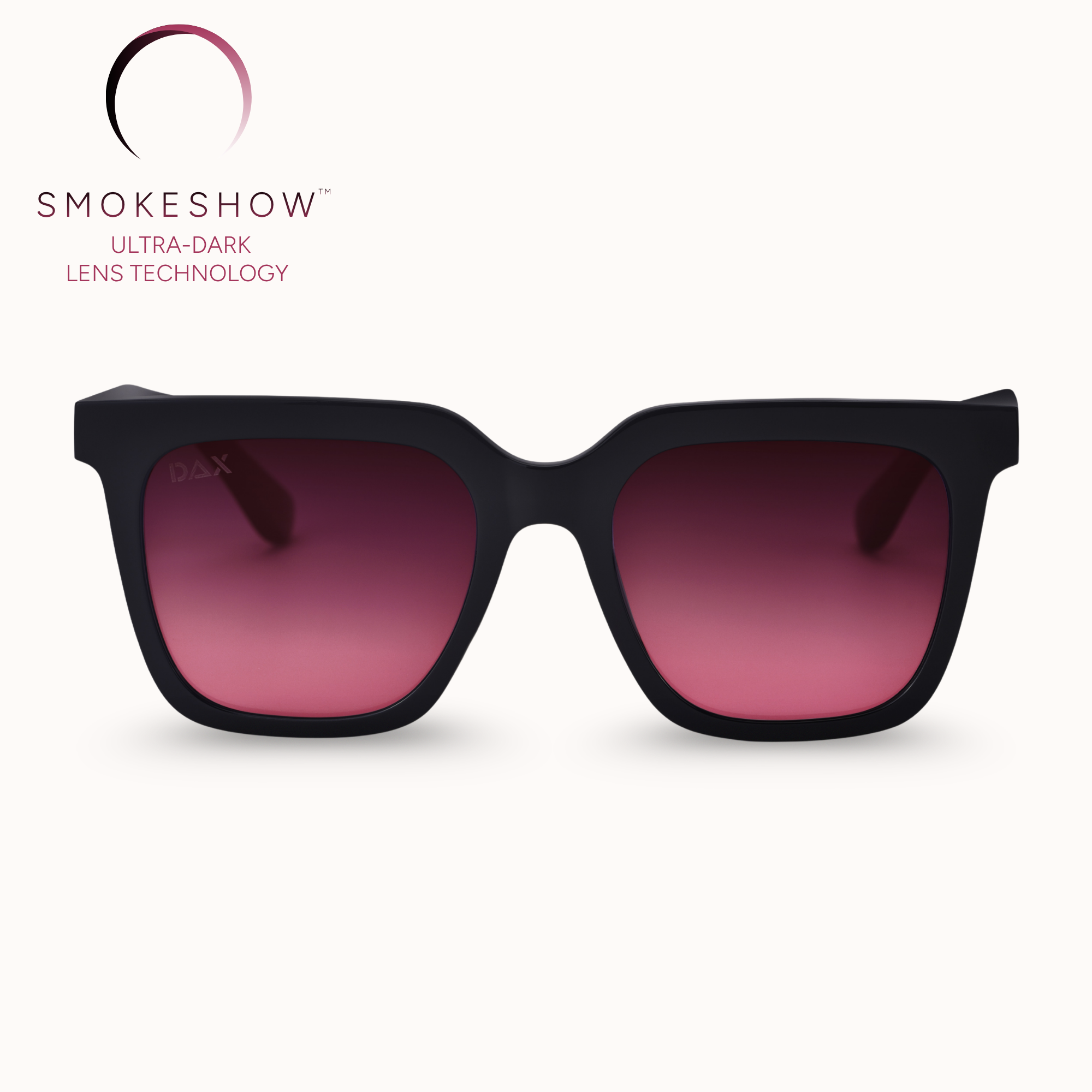 Black sunglasses with pink gradient lenses on a white background, featuring the Smokeshow logo.