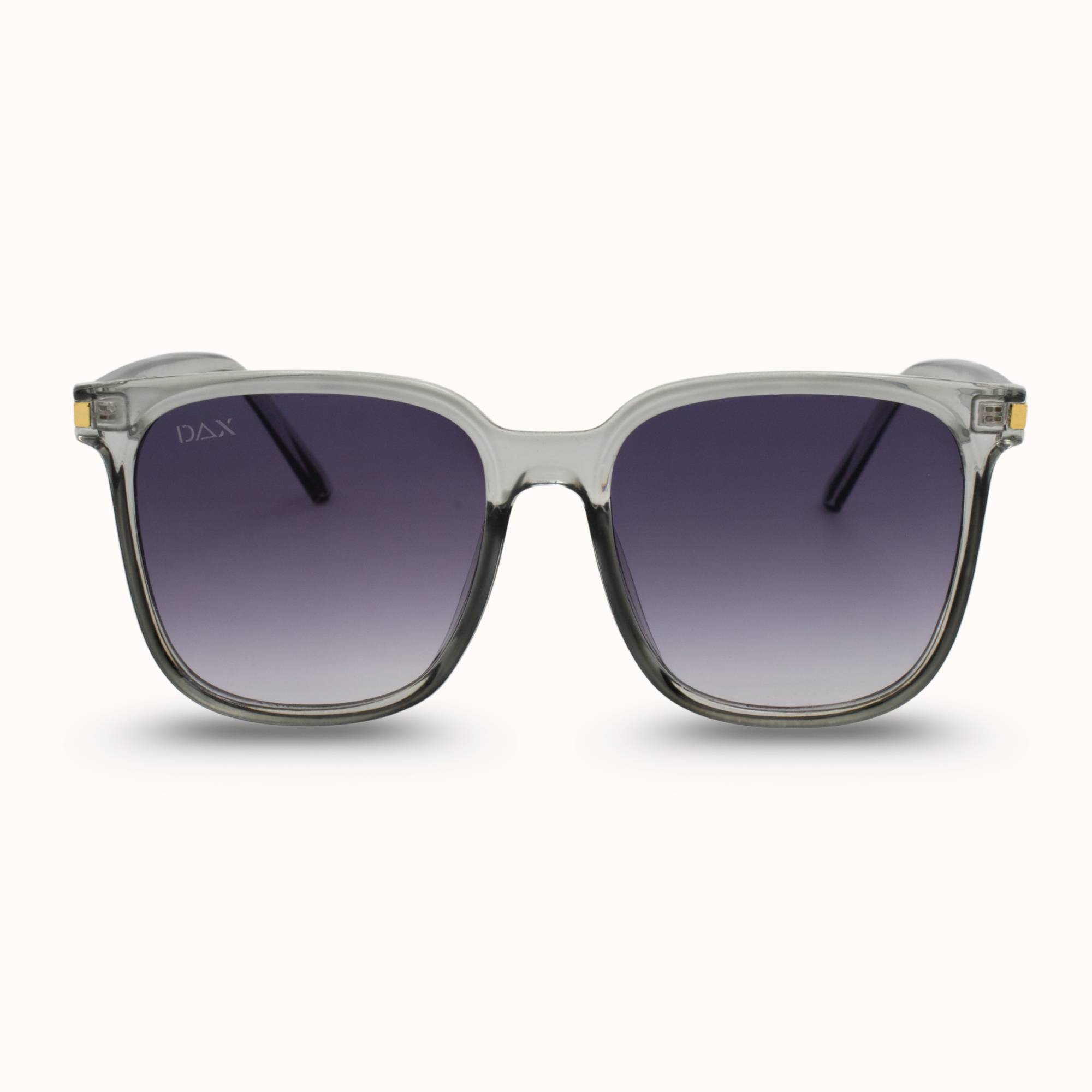 Sunglasses with a clear frame and dark gradient lenses on a white background