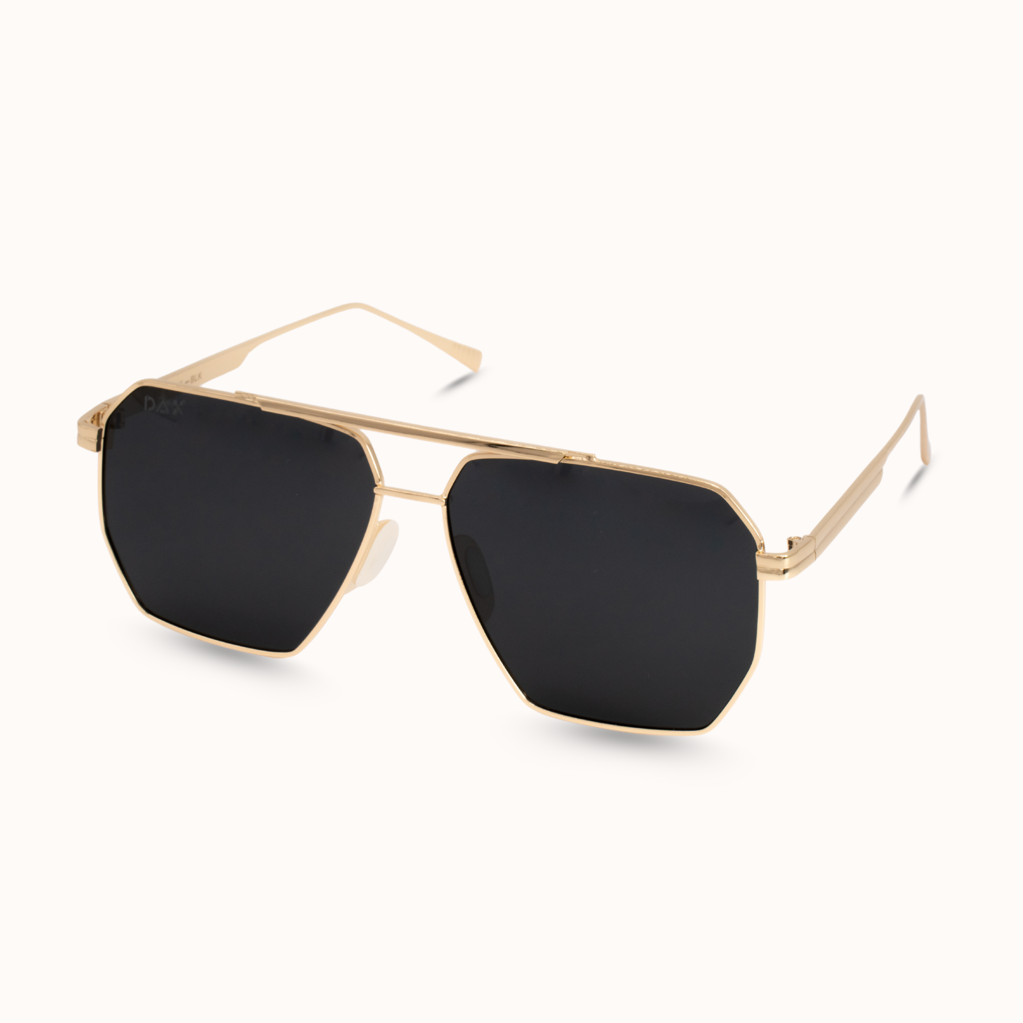 Gold-framed sunglasses with black lenses on a white background
