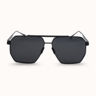 Black sunglasses with a geometric frame on a white background
