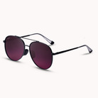An angled shot of aviators glasses with merlot lenses against a white backgound.