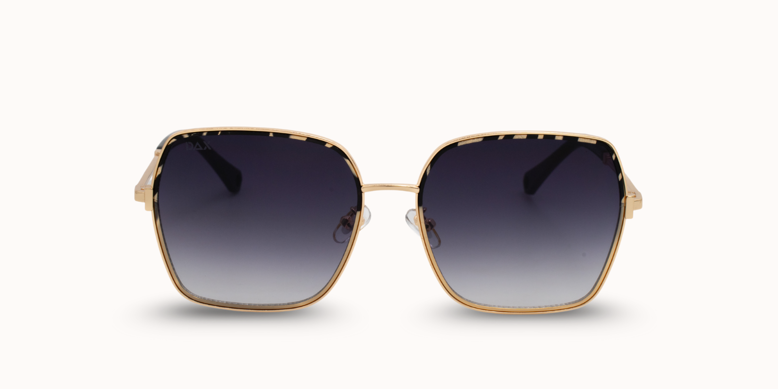 Gold-framed sunglasses with gradient lenses on a white background