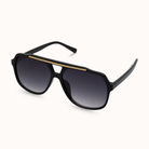 Black sunglasses with gold accents on a white background