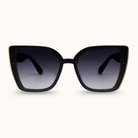 Black sunglasses with gradient lenses on a white background