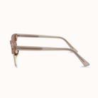 Beige eyeglasses on a white background