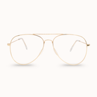 Gold aviator glasses on a white background