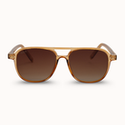Brown sunglasses with gold frame on a white background
