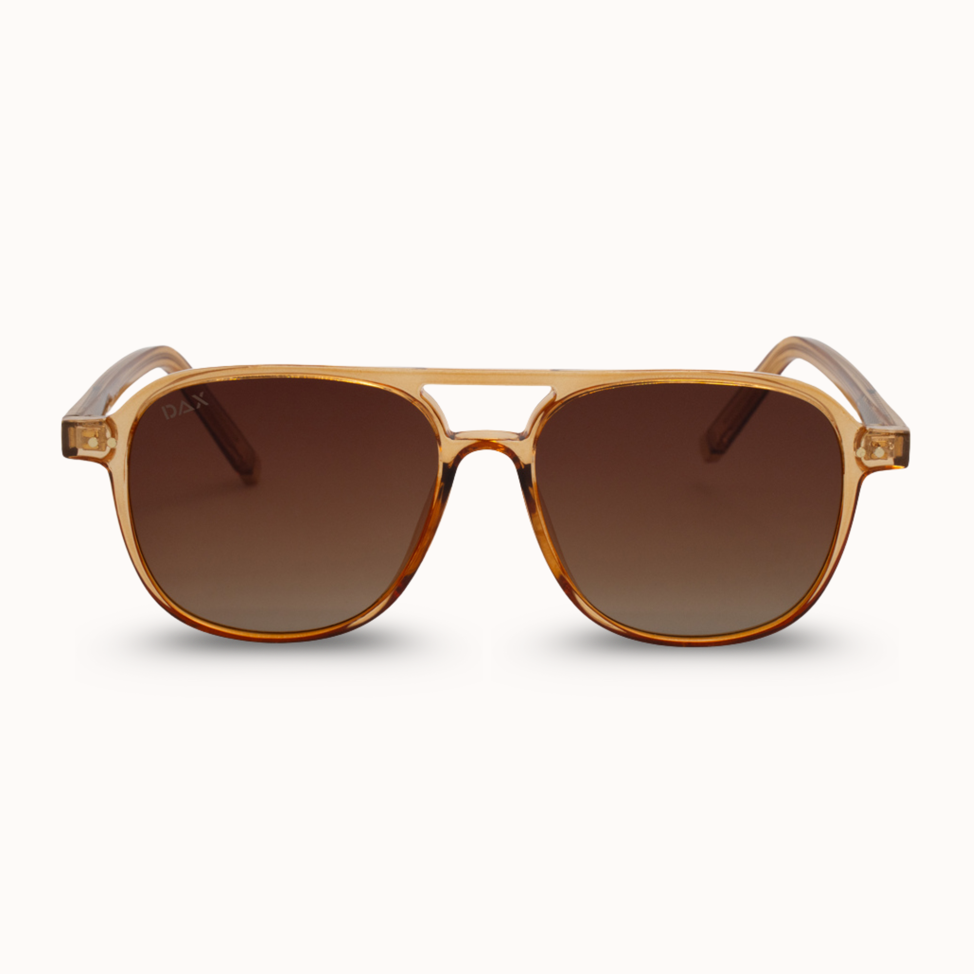 Brown sunglasses with gold frame on a white background