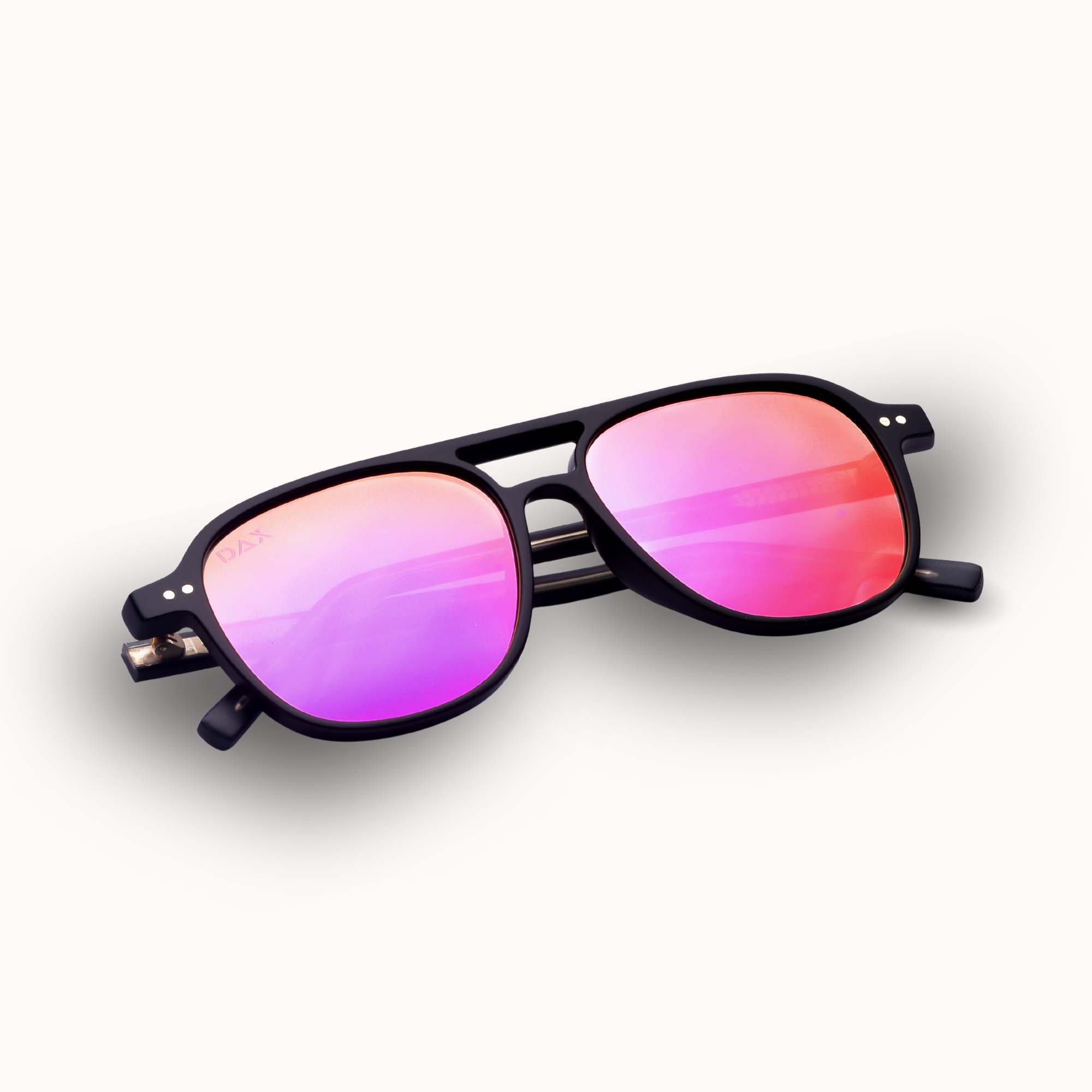 Sunglasses with pink gradient lenses on a white background