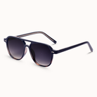 Sunglasses with dark gradient lenses and thin frame on a white background