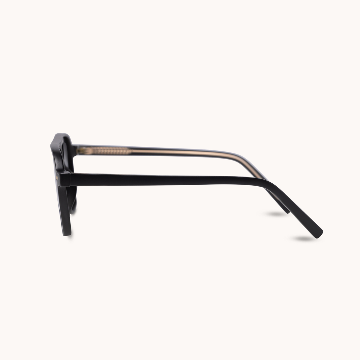 Sunglasses with a black frame and purple accents on a white background