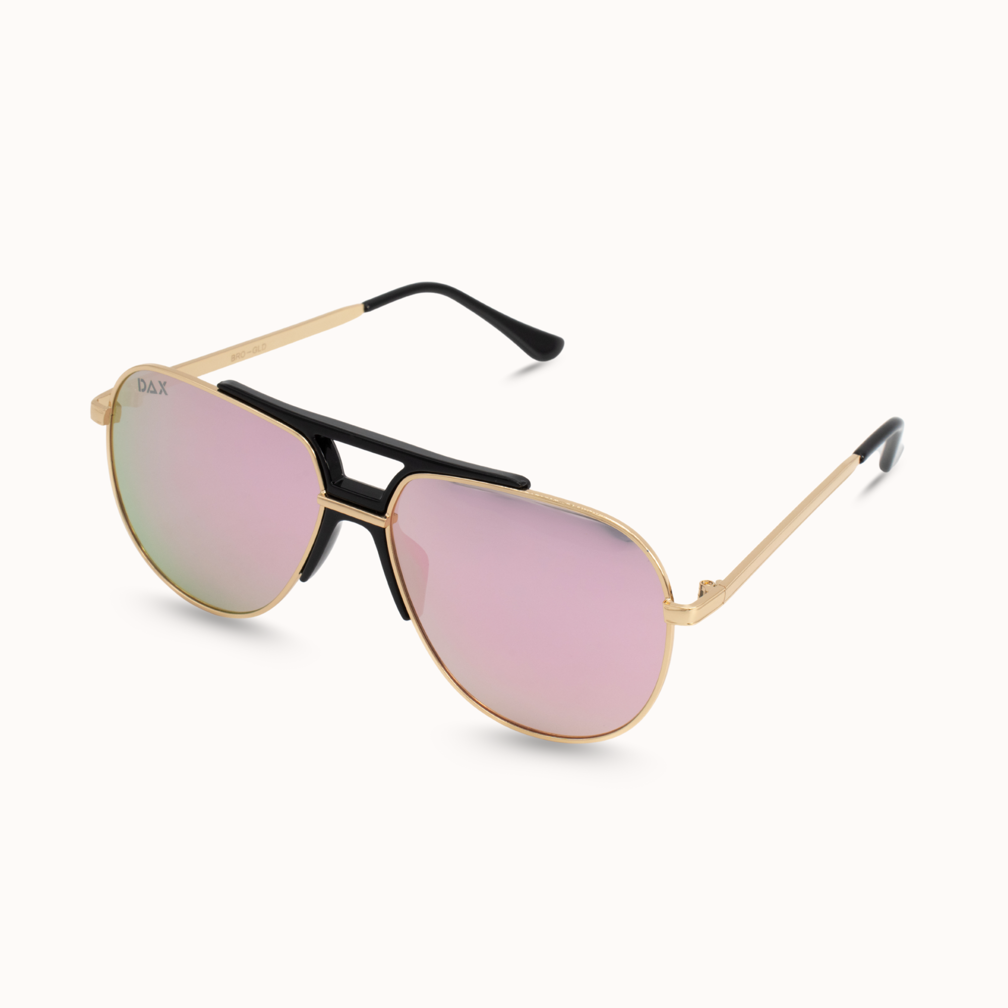 Aviator sunglasses with gold frame and pink lenses on a white background