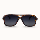Sunglasses with tortoiseshell frame and dark lenses on a white background