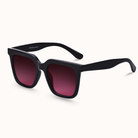 Black sunglasses with smokeshow gradient lenses on a white background