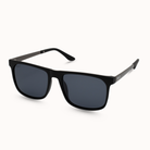 Black sunglasses with dark lenses on a white background