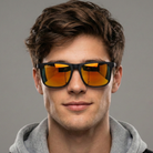 Man wearing sunglasses with orange lenses against a gray background