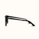 Black sunglasses with 'DAX' branding on a white background