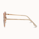 Sunglasses with a gold frame on a white background