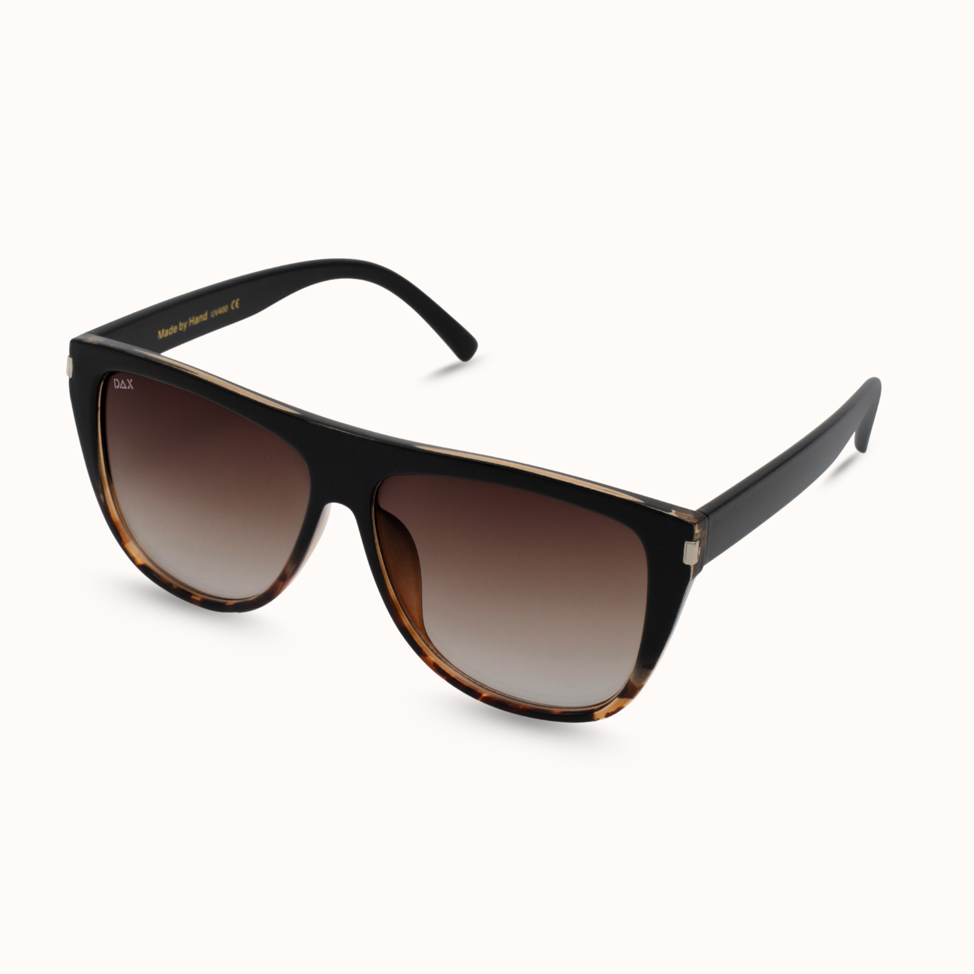 Black sunglasses with gradient lenses on a white background