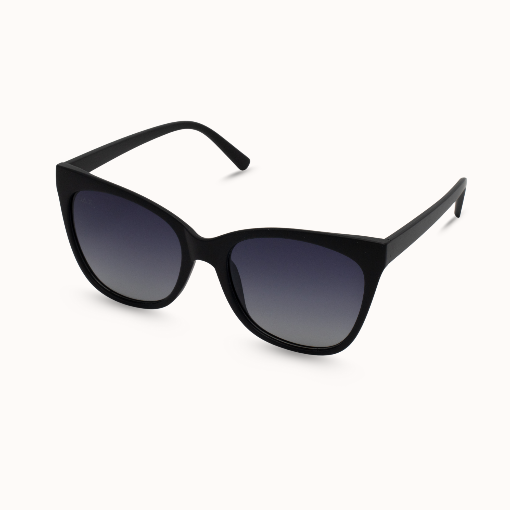 Black sunglasses with gradient lenses on a white background