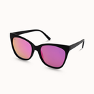 Black cat-eye sunglasses with pink-tinted lenses on a white background
