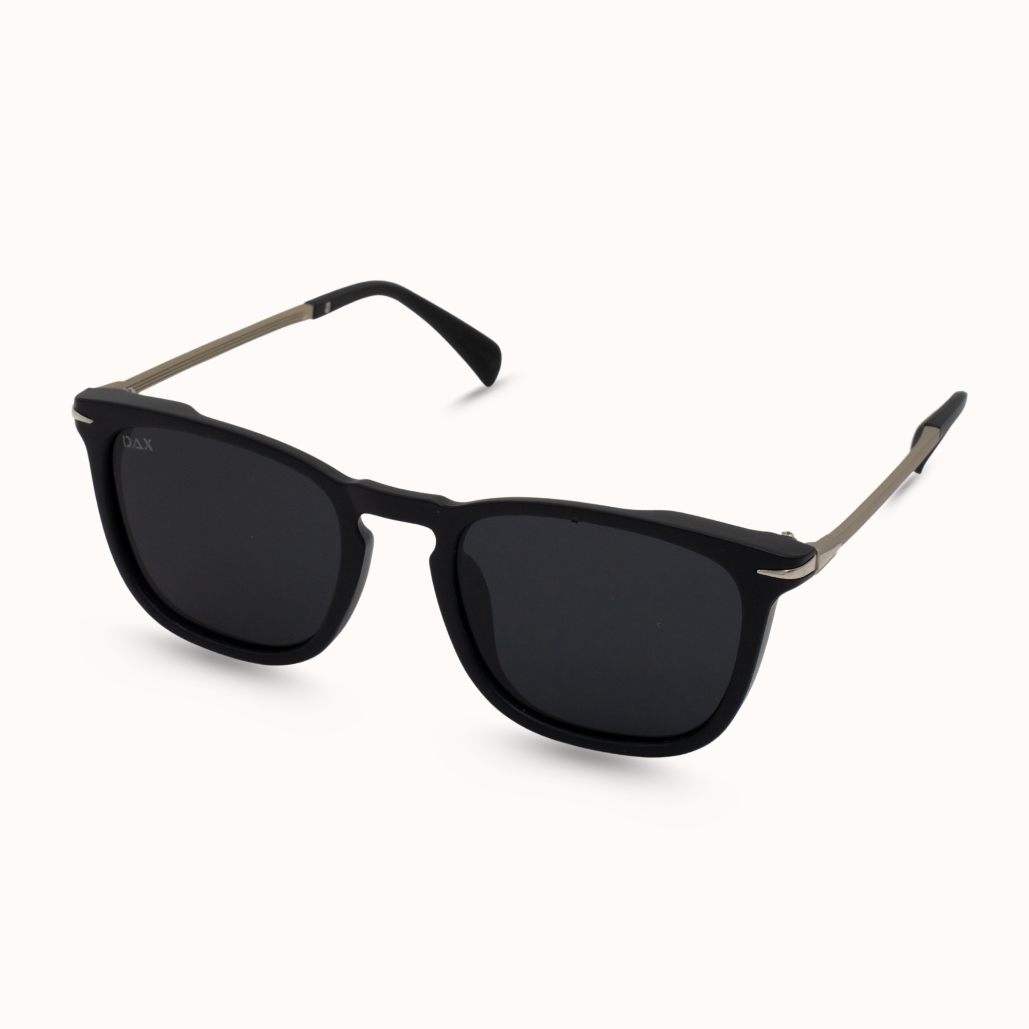 Black sunglasses with gold accents on a white background