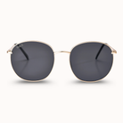 Gold-framed sunglasses with dark lenses on a white background