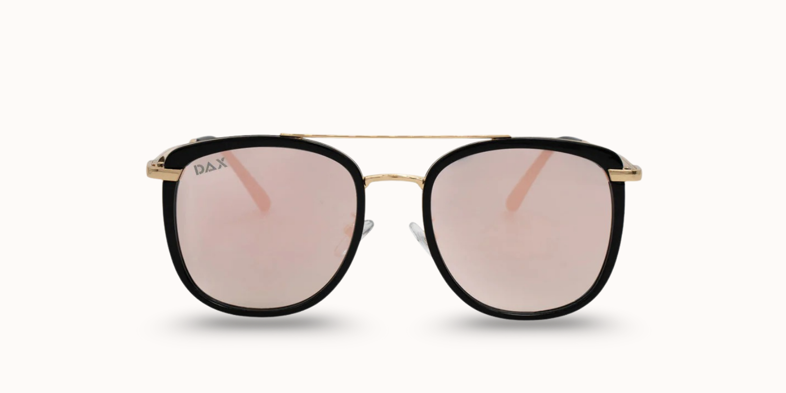 Sunglasses with black frames and pink-tinted lenses on a white background