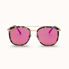 Sunglasses with pink lenses and tortoiseshell frame on a white background