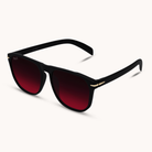 Black sunglasses with red gradient lenses on a white background