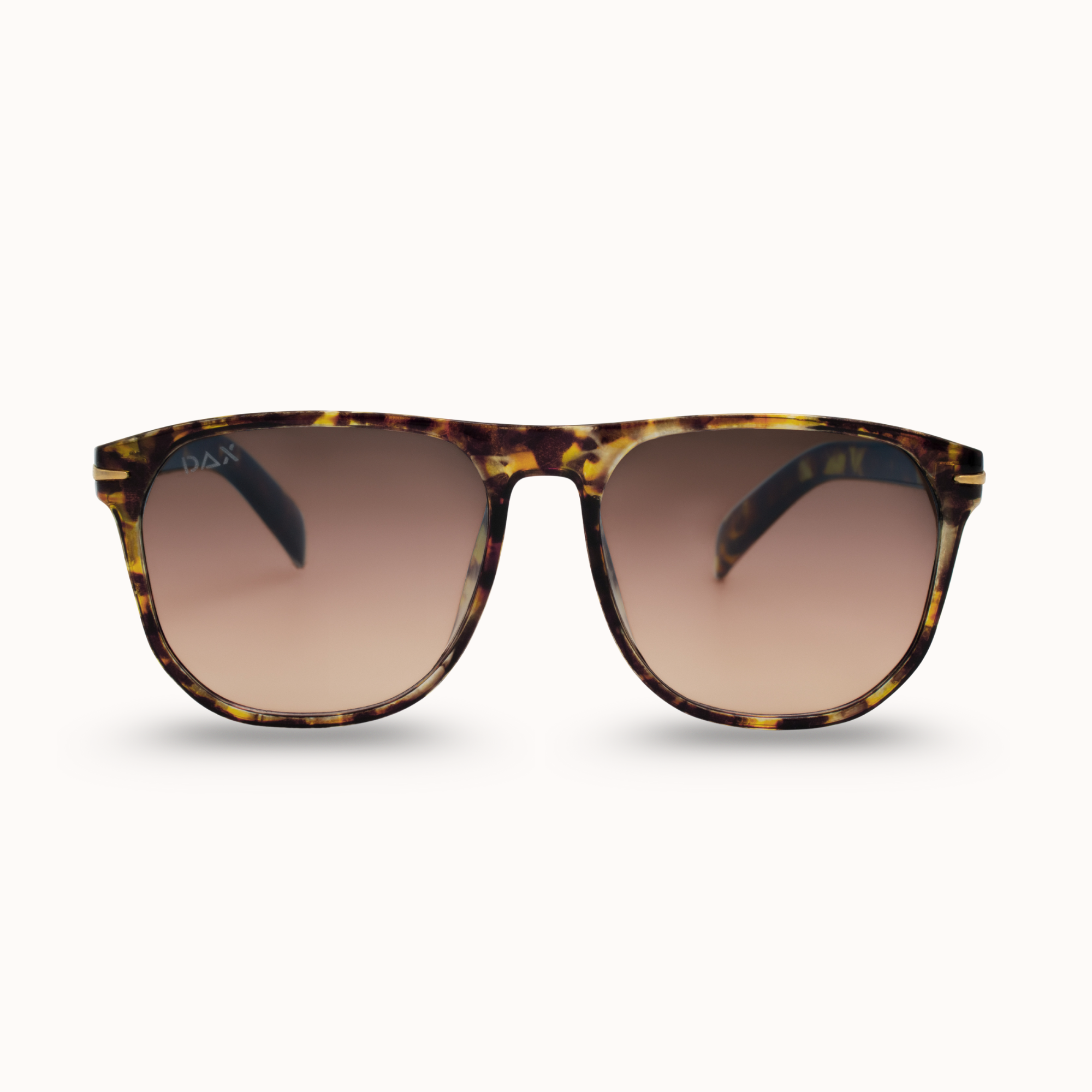 Sunglasses with tortoiseshell frame and brown lenses on a white background