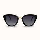 Black cat-eye sunglasses with gold frame on a white background