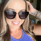 Woman wearing sunglasses with a blurred background