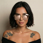 Woman wearing reflective sunglasses with a neutral background