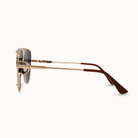 Gold-framed sunglasses on a white background