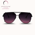 Sunglasses with gradient purple lenses on a white background, featuring the Smokeshow brand.