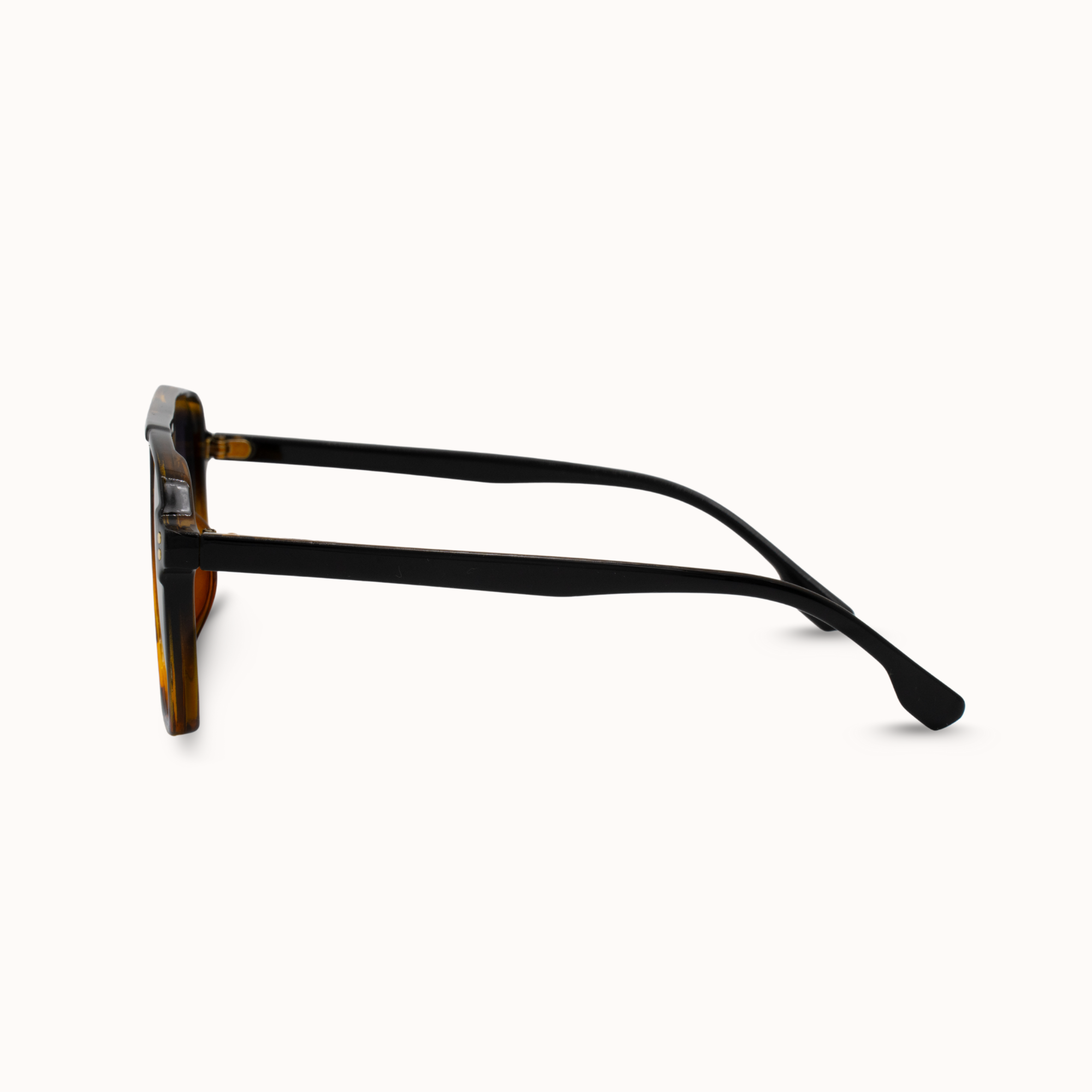 Sunglasses with a tortoiseshell frame on a white background