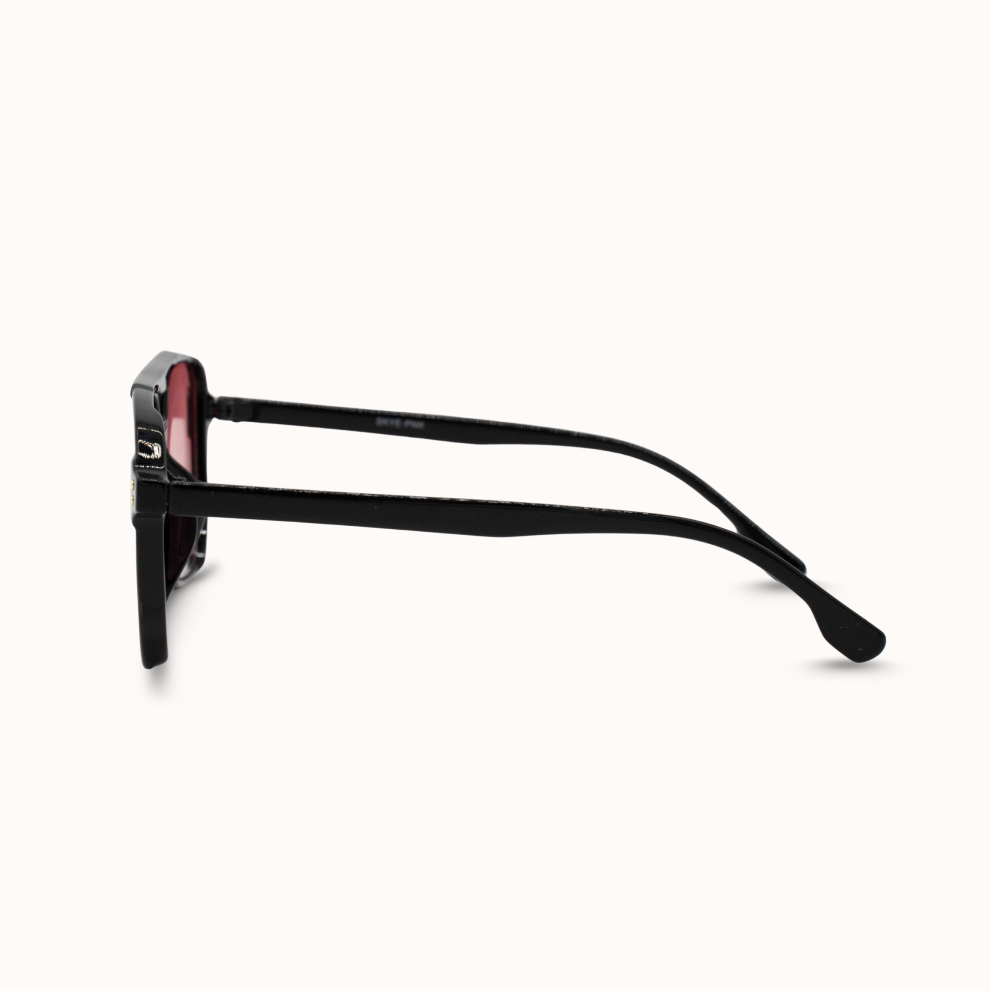 Black sunglasses with a red lens on a white background