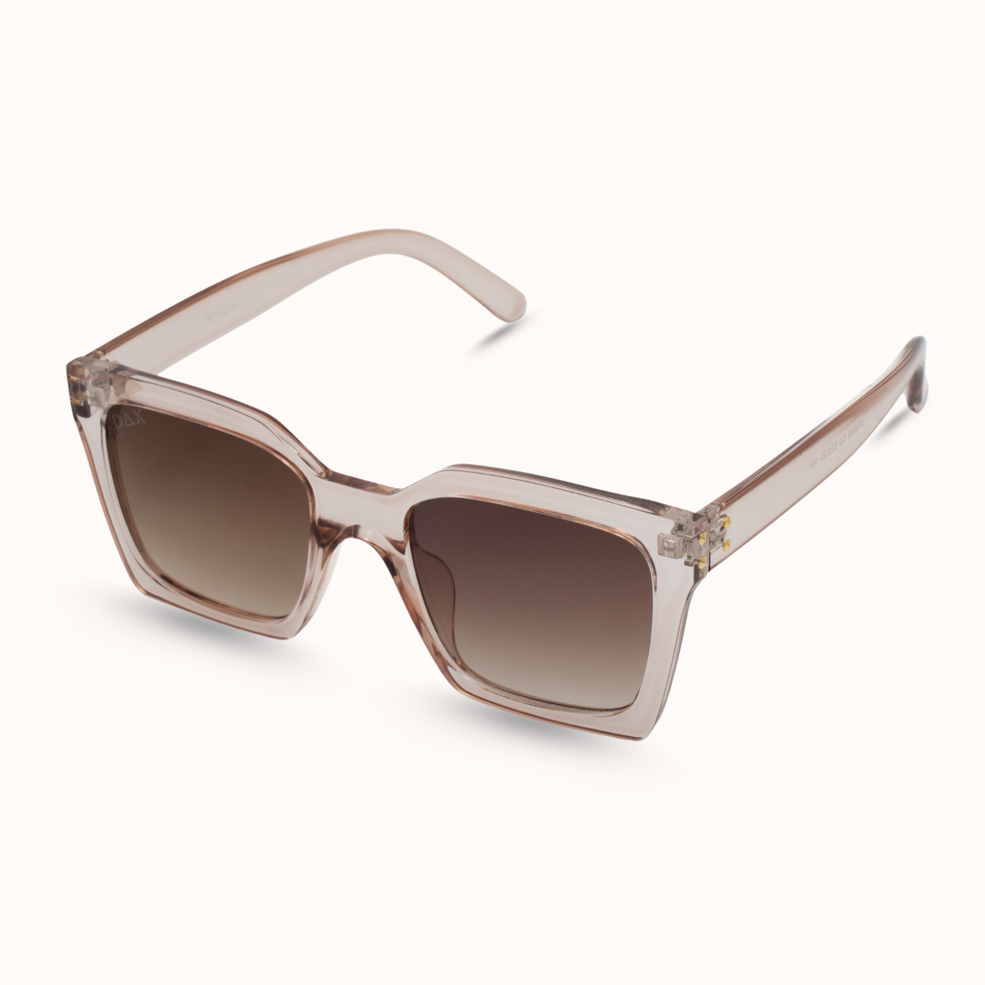 Sunglasses with a transparent frame and brown gradient lenses on a white background