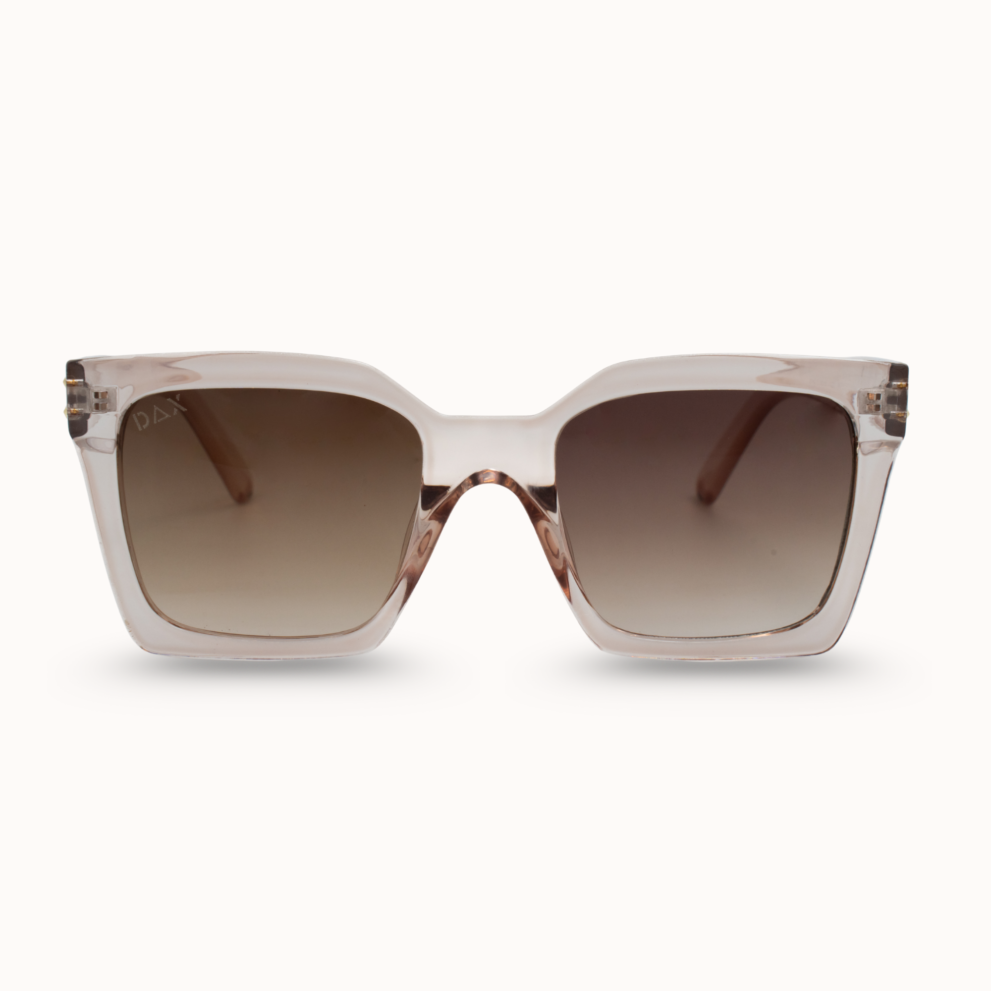 Sunglasses with a clear frame and brown gradient lenses on a white background